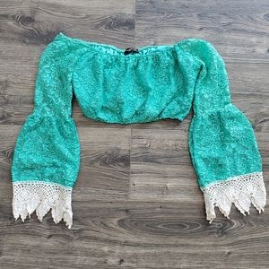 An emerald blue crop top